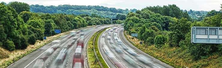 Car Insurance - motorway and trees